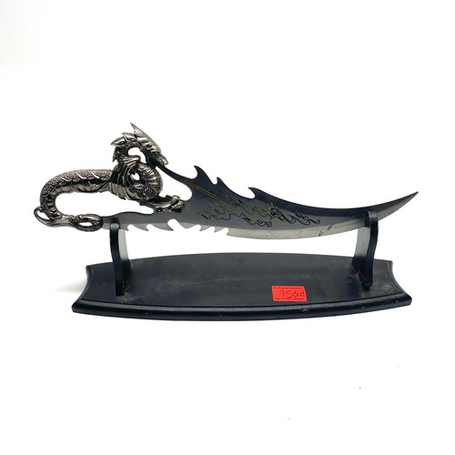 756A - Dragon display knife plus stand. Over 18 items, please note these items will not be posted. They mus... 
