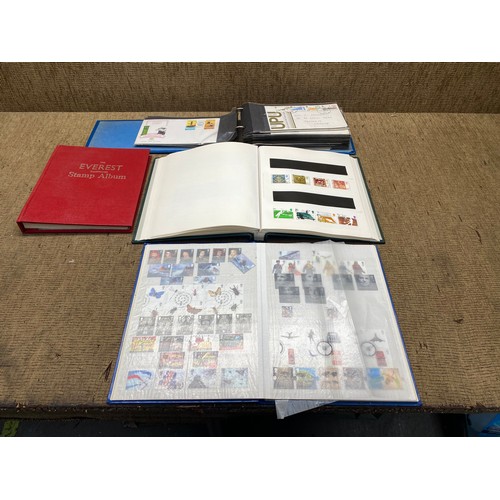 Collection of world stamps, two folders of GB stamps and a collection