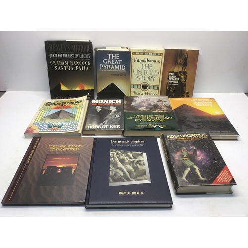 16 - A collection of hardback books including the great Pyramids, Tutankhamen and Nostradamus