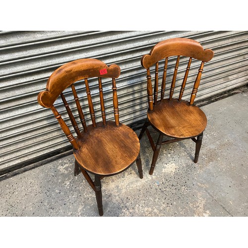 612 - A pair of oak west wales country chairs