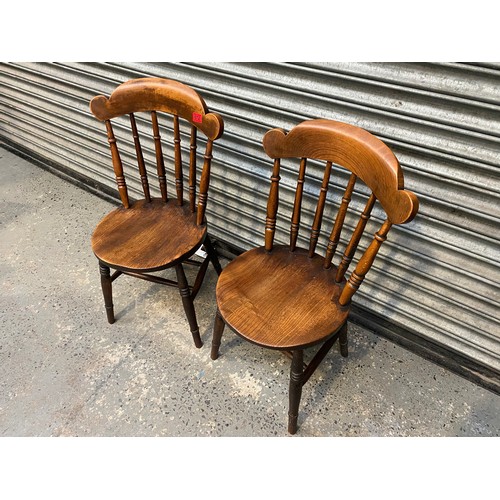 612 - A pair of oak west wales country chairs