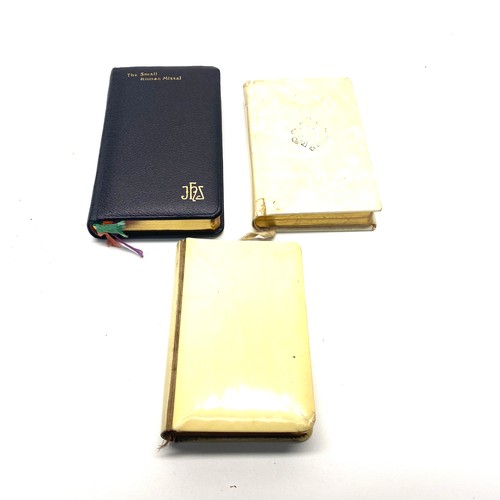 663 - 3 pocket bibles including: Mother O' Pearl bound bible.