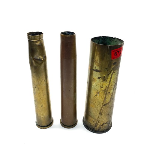 672 - 3 WWII artillery shells.