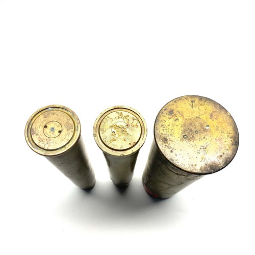 672 - 3 WWII artillery shells.