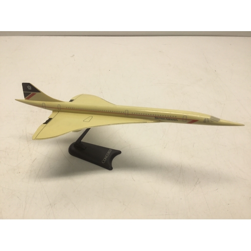 688 - Model of Concorde on a stand 24cm x 9cm