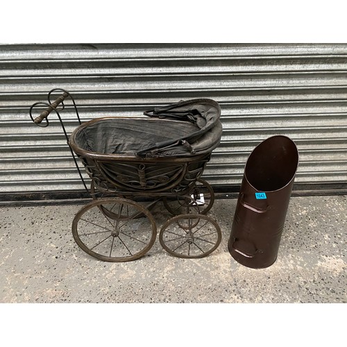 1043 - Victorian childs pram and a coal scuttle.