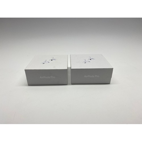 700 - 2 Pairs of bluetooth earphones.