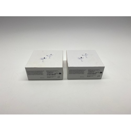 700 - 2 Pairs of bluetooth earphones.