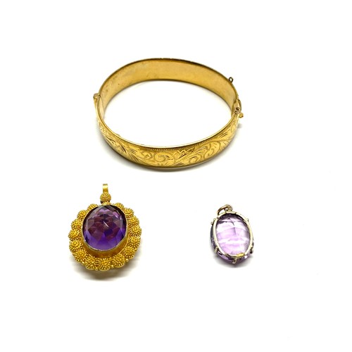 718 - 9ct rolled gold bangle, large extremely pretty amethyst stone in a silver mount (NHM) and a yellow m... 