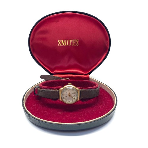 984 - 9ct gold ladies Smiths watch in its original box.