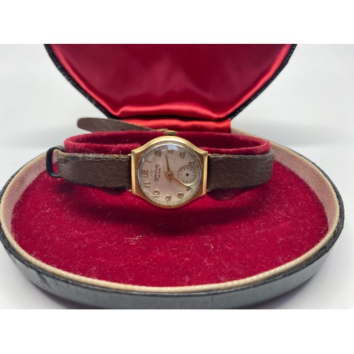 984 - 9ct gold ladies Smiths watch in its original box.