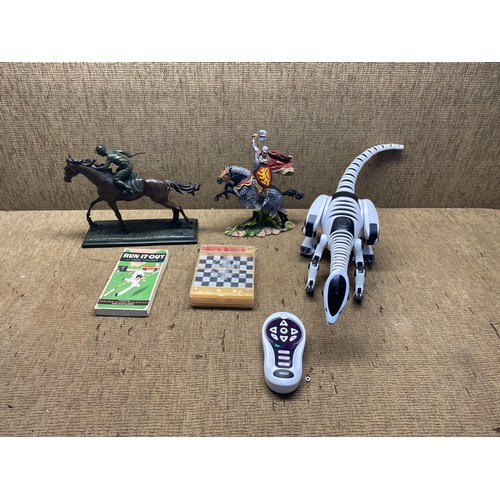 455 - mixed items including wow wee roboraptor with remote control resin jockey riding horse sculpture.