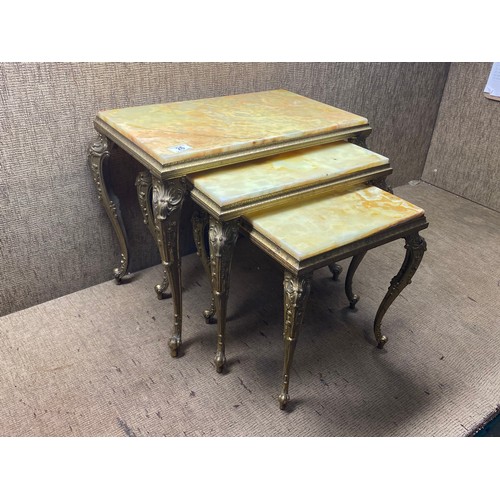 26 - Marble/onyx nest of tables with brass frame