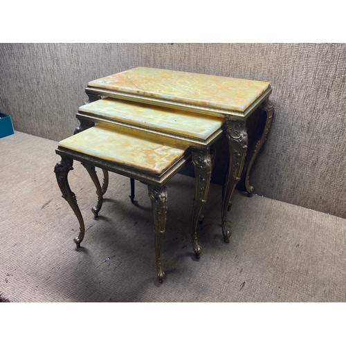 26 - Marble/onyx nest of tables with brass frame