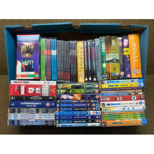 29 - Selection of DVD box sets including: Family Guy, Primeval and The Big Bang Theory.