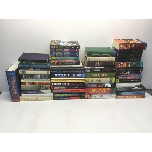 128 - A collection of hardback and paperback books