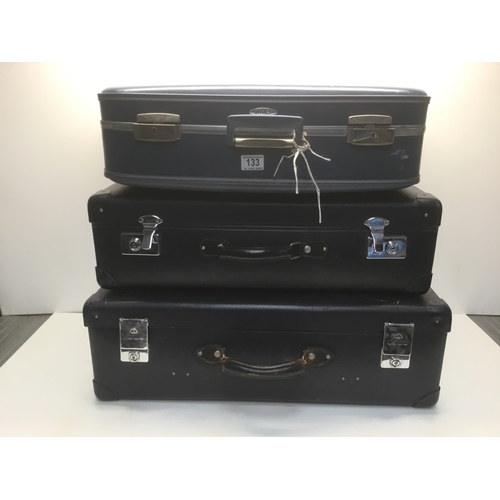 133 - Three hard cased suitcases