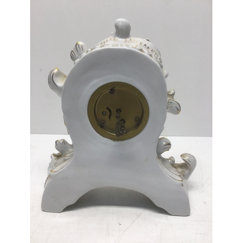 720 - German porcelain mantle clock with marks to base