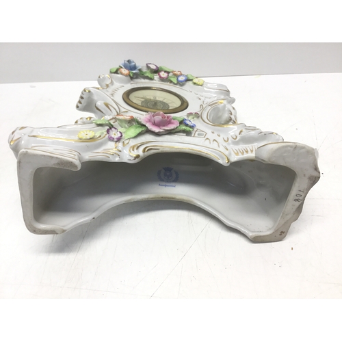 720 - German porcelain mantle clock with marks to base