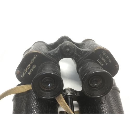 723 - Two pairs of military binoculars Bino Prism Mk11 by Kershaw