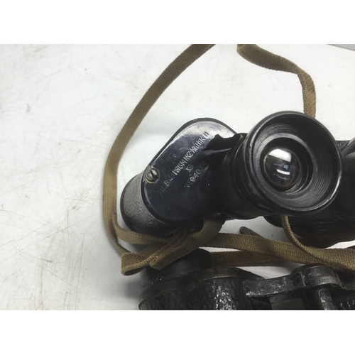 723 - Two pairs of military binoculars Bino Prism Mk11 by Kershaw