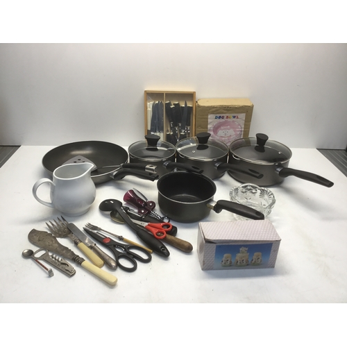 181 - Kitchen items including saucepans and cutlery