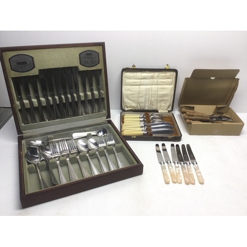 488 - A quantity of cutlery including fish knife set, Viners boxed set and wooden handled cutlery