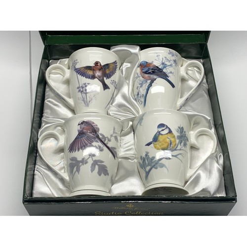 492 - studio collection by william james set of 4 fine china beakers.