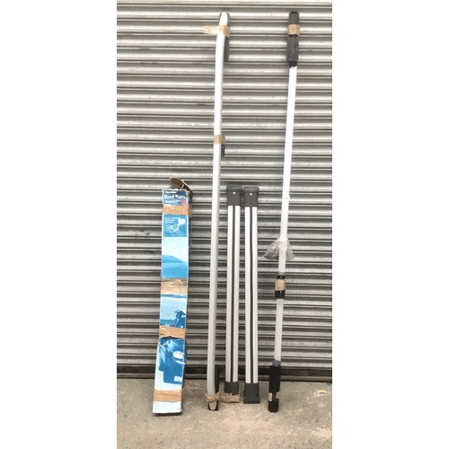 239 - A set of VW T5 roof bars and a set of Halfords universal roof bars