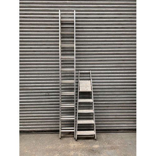 221 - domestic double extension ladder and a step ladder.