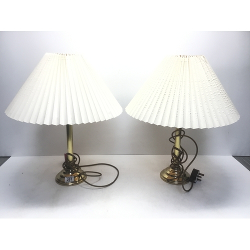 261 - A pair of brass Corinthian column lamps