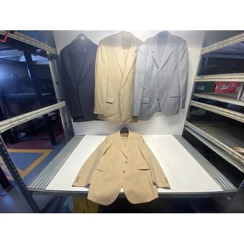 284 - 4 mens taylor made suits including lord john, travel master sizes 44L.