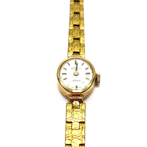 874 - 9ct gold ladies rotary watch with gold plated strap.