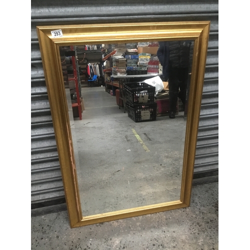 293 - Large bevel edged mirror 99cm x 68cm