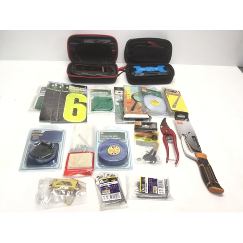 181A - Two car vehicle portable booster packs and a selection of gardening items