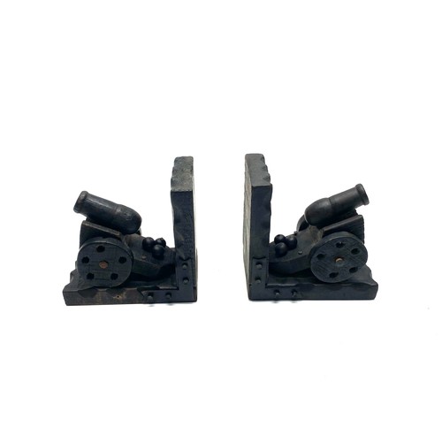 711 - 2 black forest style cannon bookends.