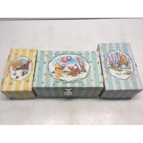 461 - A set of three Winnie the Pooh graduated storage boxes