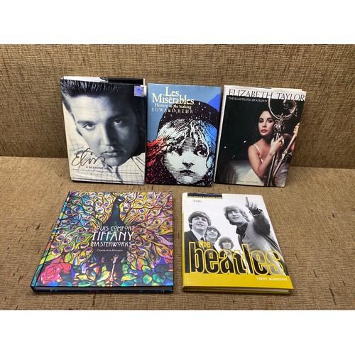 463 - 56 illustrated books including: Elvis: A celebration, The Beatles and Elizabeth Taylor.