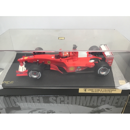 761 - Two Hotwheels Michael Schumacher die cast cars 2000 and 2003