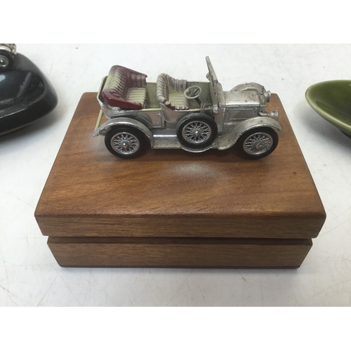 706 - Two vintage ashtrays with cars and a cigarette box