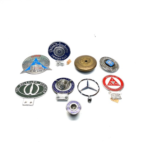 858 - Collection of car badges including: Royal Automobile, Wolsley and Mercedes Benz.