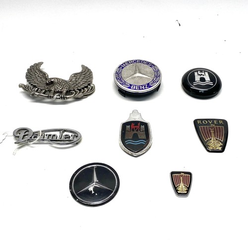 860 - collection of car badges including: Mercedes Benz, Daimler and Rover.