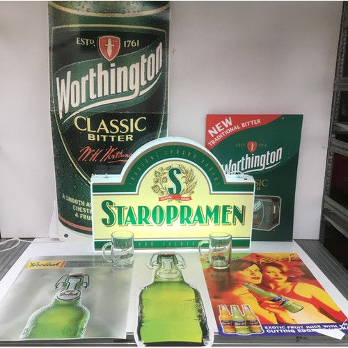 1125 - A working Staropramen light up pub sign including two pint glasses and a selection of pub posters