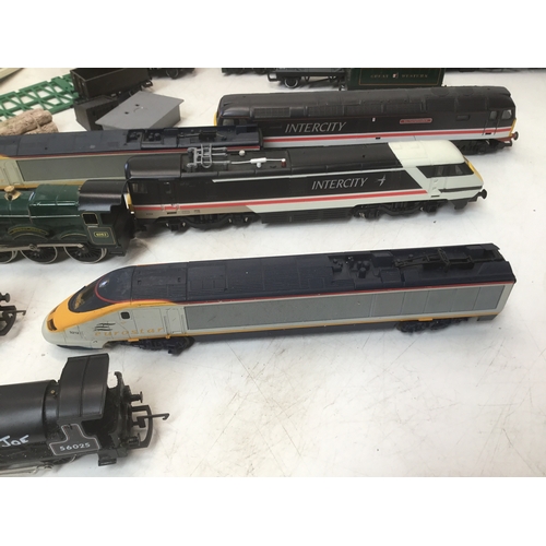 1137 - A selection of Hornby train carriages and engines