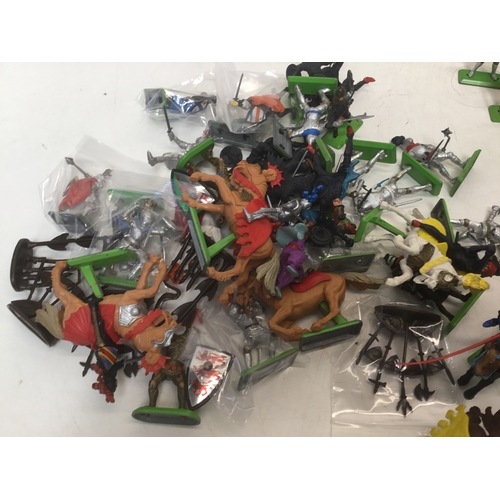 1165 - Britains 1970’s toy figures including knights, horses and a plastic fort