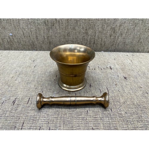 830E - Antique brass pestle and mortar.