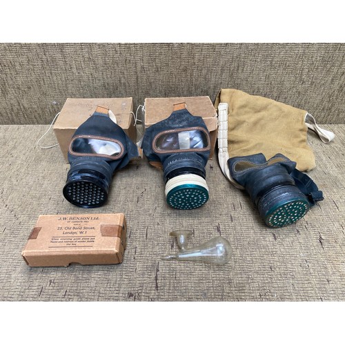 831E - vintage world war two civillian gas masks.