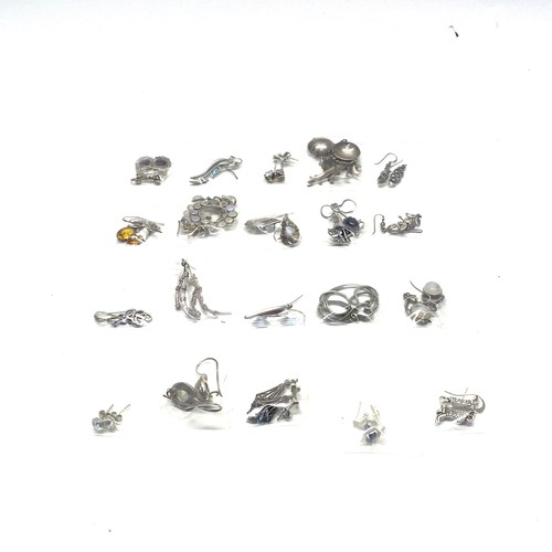 832 - Approx. 20 pairs of mostly silver earrings.