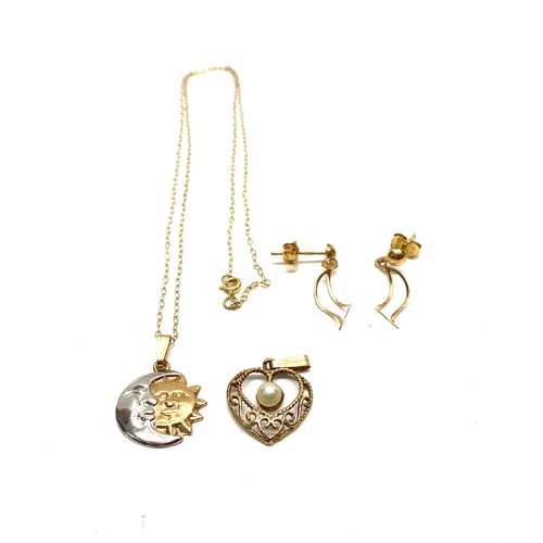 926 - 9ct gold earrings, pennant and a sun pendant and chain. 2.4g