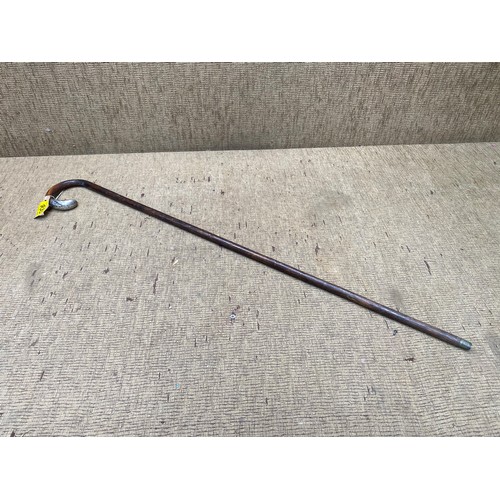 935 - Walking cane with sterling silver attchmnet to handle, hallmarks for London 1920.